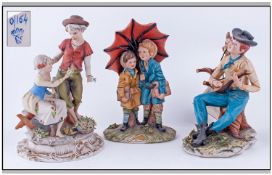 Capodimonte Signed And Early Figures, 3 In Total. 1, Boy and girl under an umbrella, signed Gianni