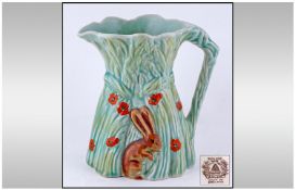 Burleigh Ware Jug with rabbit decoration to side. Full marks to base, 7.5 inches in height.