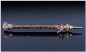 19th Century Yellow Metal Propelling Pencil, with engraved floral decoration with Citrine terminal.