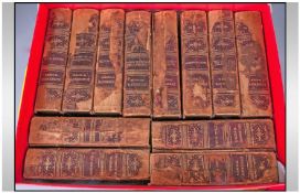 Set Of Dickens Books, 12 volumes of Dickens works/novels with leather spines and tooled gilt work.