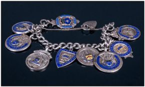 A Silver Albert Bracelet, Loaded with 9 Silver Vintage and Enamel Medals, Adwarded for Various