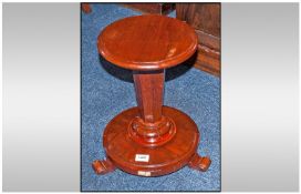 A Victorian Small Round Side Table made up of associated elements. 16" in height.