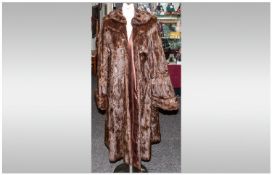 Ladies Three Quarter Length Squirrel Dark Brown Coat fully lined. Hook & Loop Fastenings. Cuff