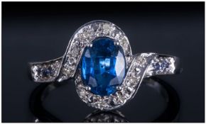 9ct White Gold Cluster Ring, Set With A central Blue Sapphire Surrounded By Diamond Chips, Fully