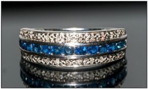 A Platinum Set Diamond and Sapphire Half Eternity Ring, Marked 950. Retails over £850.00