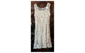 Designer Solitaire Dress New With Tags Size Small.  Plain Cream Dress with a Knitted style overlay