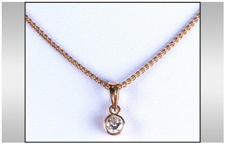 A 18ct Gold Set Single Stone Diamond Pendant, Fitted to 18ct Gold Foxtail Chain. The Round Diamond