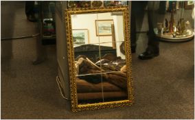 Contemporary Gilt Framed Mirror with 6 bevelled glass panels. 19 by 30 inches.