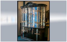 Large Modern Italian Style Display Cabinet with glazed front and elaborate decoration.