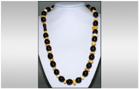 Antique - Quality Natural Amber Bead Necklace with Butterscotch Coloured Spacers. Length 26 Inches.