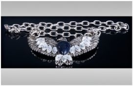 Blue Sandstone and White Crystal Eagle Bib Necklace, a pear cut cabochon blue sandstone, also