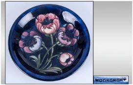 William Moorcroft Early Footed Bowl. c.1920`s.  ` Poppies ` Pattern on Blue Ground. Diameter 7.25