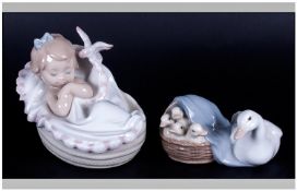 Lladro Figures, 2 in total, 1. Comforting Dreams, model number 6710. 3.75`` in height. mint