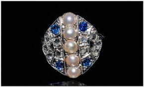 Art Deco Diamond & Sapphire Ring the ring consists of a centre line of five cultured pearls, Set