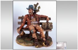 Capodimonte Signed Figure ` Tramp on a Bench ` Signed Volta. Height 10 Inches, With Original