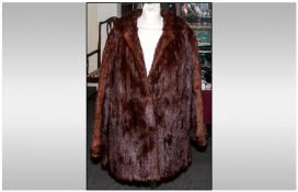 Ladies Three Quarter Length Red/Brown Mink Coat. Fully lined. Cuff Sleeves, Hook & Loop Fastenings.