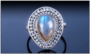 Hand Made Labradorite Ring, a pear cut cabochon of over 4cts, mounted in a silver bezel setting
