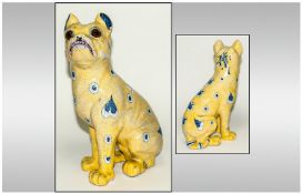 A Galle Faience Figure Of A Pug Dog Emile Galle, c1880`s Height 12 3/8inches. (31.5cm.)  Underglaze