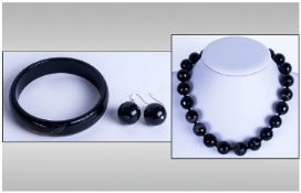 A Good Quality Faceted Banded Agate Necklace with matching bangle & earrings. Necklace 18`` in
