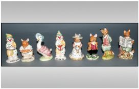 A Collection Of Royal Doulton & Beswick Figures including 1. Foxy Reading, 2. Foxy Whiisked