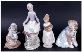 Four Lladro Figures comprising `Girl Curtsying To Rabbit`, `Girl Holding Apples`, `Girl With