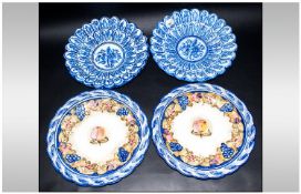 Two Pairs Of Decorative Blue & White Plates, with scalloped edging. One with floral decoration, the