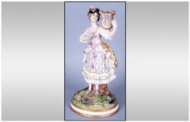 Capodimonti Style Lyre Player in the 18thC type costume, hand painted with floral and gilt