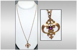 Victorian 9ct Gold Amethyst Set Pendant, Fitted to a 9ct Gold Chain. Length 24 Inches. Marked 9ct.