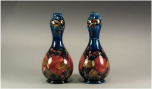 Moorcroft Pair of Double Gourd Shaped Vases, an unusual shape in the `Pomegranate and Berries`