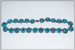 Teal Blue Crystal Floral Necklace, large, bright teal Austrian crystals set in a continuous row of