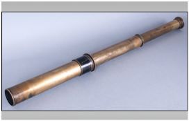 A Two Draw Brass Telescope by Dolland of London stamped `Signalling a Telescope no 8825`.