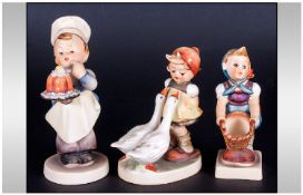 Hummell Figures, 3 in total, 1. Girl with Geese, 2. Boy Chef, 3. Girl with Basket.