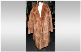 Ladies Three Quarter Length Honey Coloured Musquash Coat, fully lined. collar with revers. Hook &