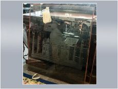 A Large Smoky Brown Glass Window with a deep engraving of The Taj Mahal. 43 by 46 inches.