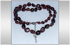 Red Garnet Bead Necklace, polished, ovoid, Indian red garnets, knotted onto red silk and fastened