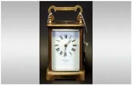 French Antique 8 Day Striking Carriage Clock striking on a gong with visible escapement. Retailed