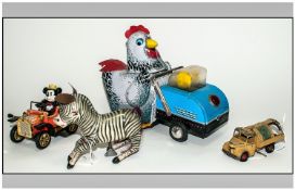 A Collection of Vintage - Mechanical Tin Toys ( 4 ) In Total, Comprises Large Clockwork Hen Pushing