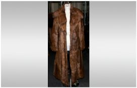 Ladies Three Quarter Length Coney Coat, collar with revers, slit pockets. Fully lined. Cuff