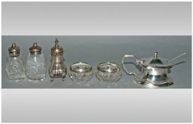 Small Collection Of Silver Comprising Two Glass Silver Rimmed Salts, Silver Pepperette, Two Glass