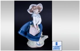 Lladro Figure, `Pretty Pickings` model number 5222, 7`` in height. Mint condition complete with