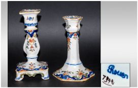 Two French Faience Candlesticks 7.5 inches in height.