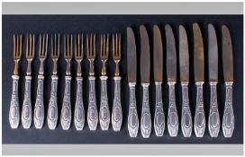 Set of Eight Dessert Knives with eight matching dessert forks. Continental with silvered metal