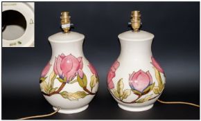 Moorcroft Modern Pair Of large Globual Shaped Table Lamp Bases `Coral Magnolia` Pattern on cream