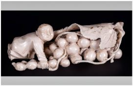 Chinese Late 19th Century Ivory Carving of a Fruit Picker, Covering His Crop. Unsigned. 3.75 Inches