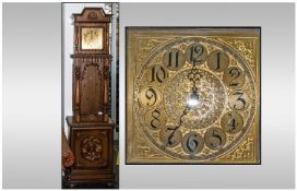 A Modern Type Brown Faced Grandfather Clock probably Austrian or German with a brass square face.