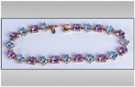 9ct Gold Amethyst And Blue Topaz Bracelet Set With Alternating Coloured Gemstones, Length 7½ Inches