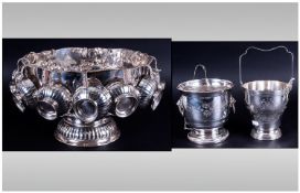 A Vintage Silver Plated Large Punch Bowl complete with 12 matching cups. 8`` in height, 12.5`` in