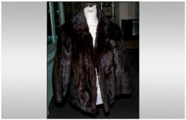 Ladies Dark Brown Mink Jacket, fully lined. Collar with revers. hook & loop fastening. slit