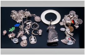 Small Mixed Lot Of Silver/White Metal Jewellery Comprising Coin Bracelet, Childs Rattle, Odd Loose