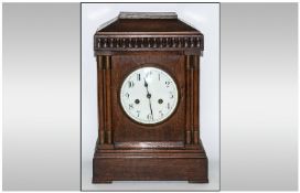 German / Austrian 19th Century Oak Cased Mantel Clock with Eight Day Striking and Chiming Movement